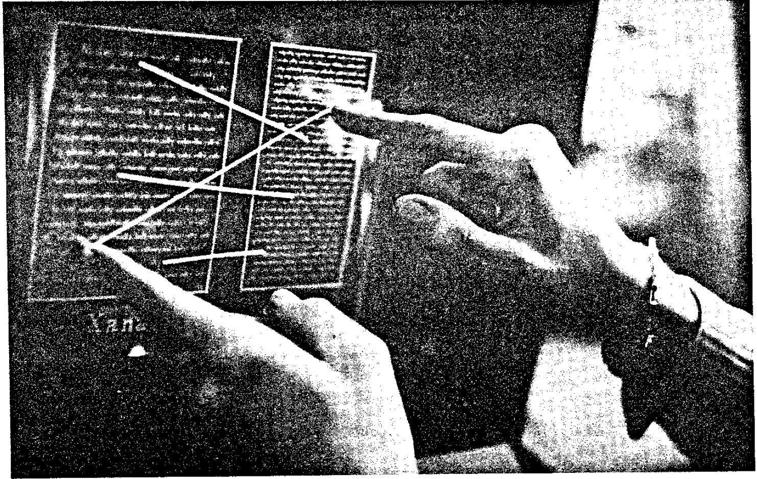 Dobový mockup rozhraní Xanadu z roku 1972: obrazovka s paralelními sloupci textu propojenými čarami. Zdroj: Hypha Digital Garden